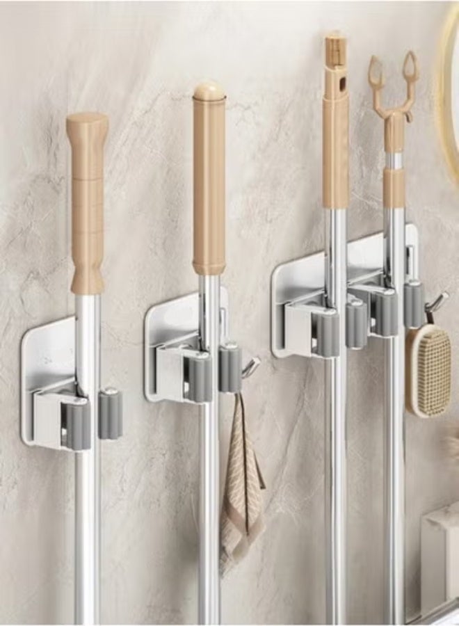 4-piece broom and mop rack, suitable for broom and mop handles, toilet brushes, etc., with stainless steel mop hooks. Wall-mounted multifunctional rack, comes with 3M double-sided tape, easy to install. - Image 2